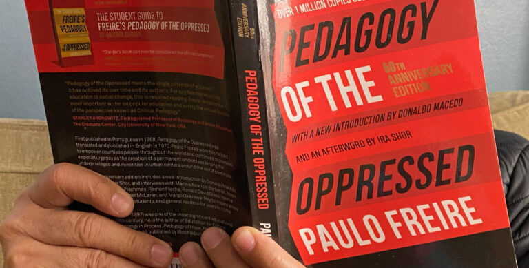 close up of Pedagogy of the Oppressed by Paolo Freire book cover